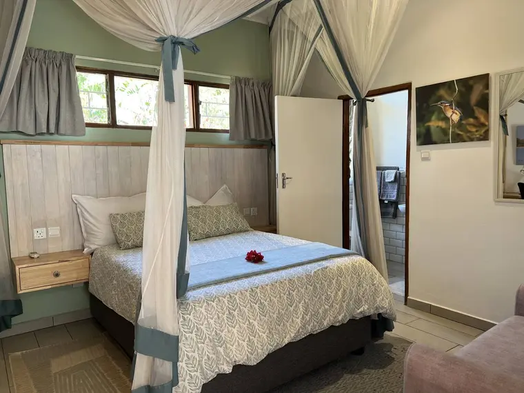 Classic Double room with queen bed and mosquito net at Wendel's Guest House