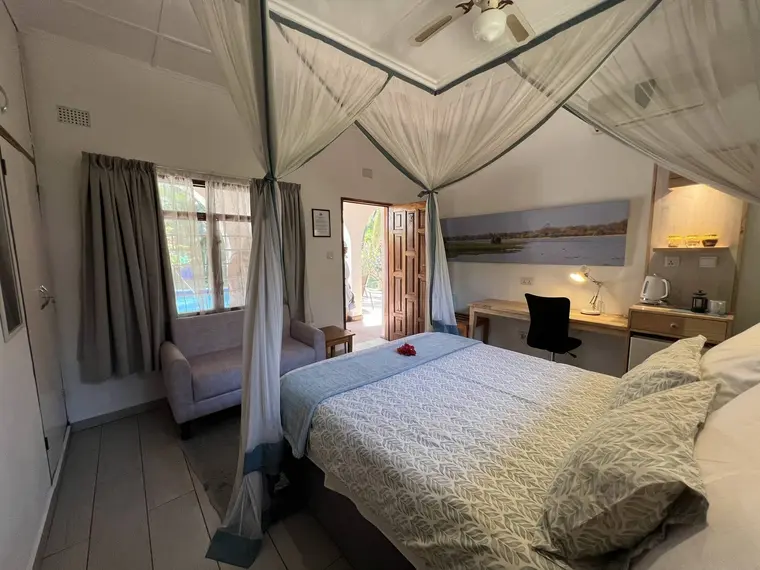 Spacious Double room with work desk and garden terrace at Wendel's Guest House