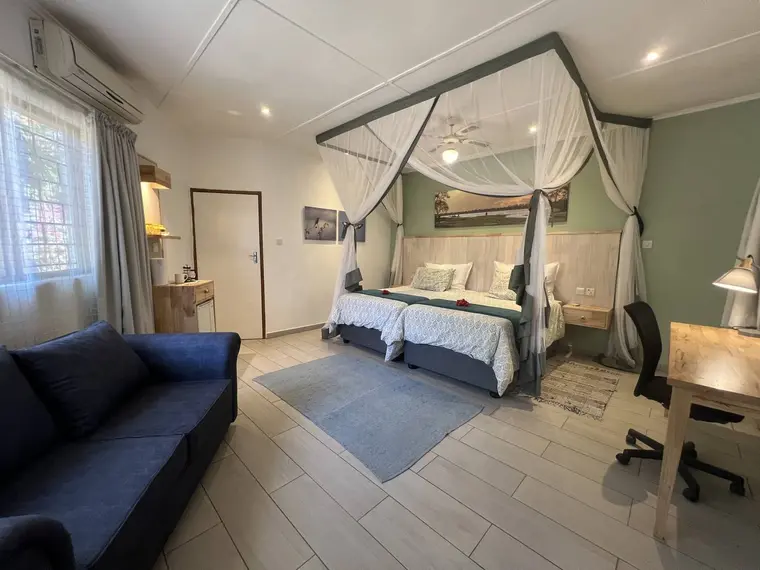 Twin room with two single beds at Wendel's Guest House